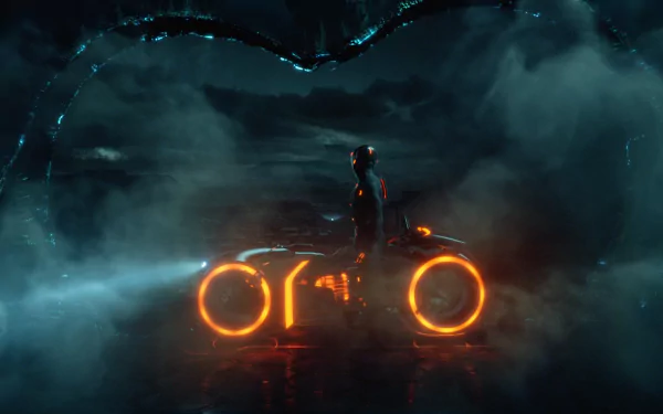 TRON: Legacy movie HD PC desktop wallpaper — silhouetted rider atop a glowing orange light cycle cutting through fog in a neon digital landscape.