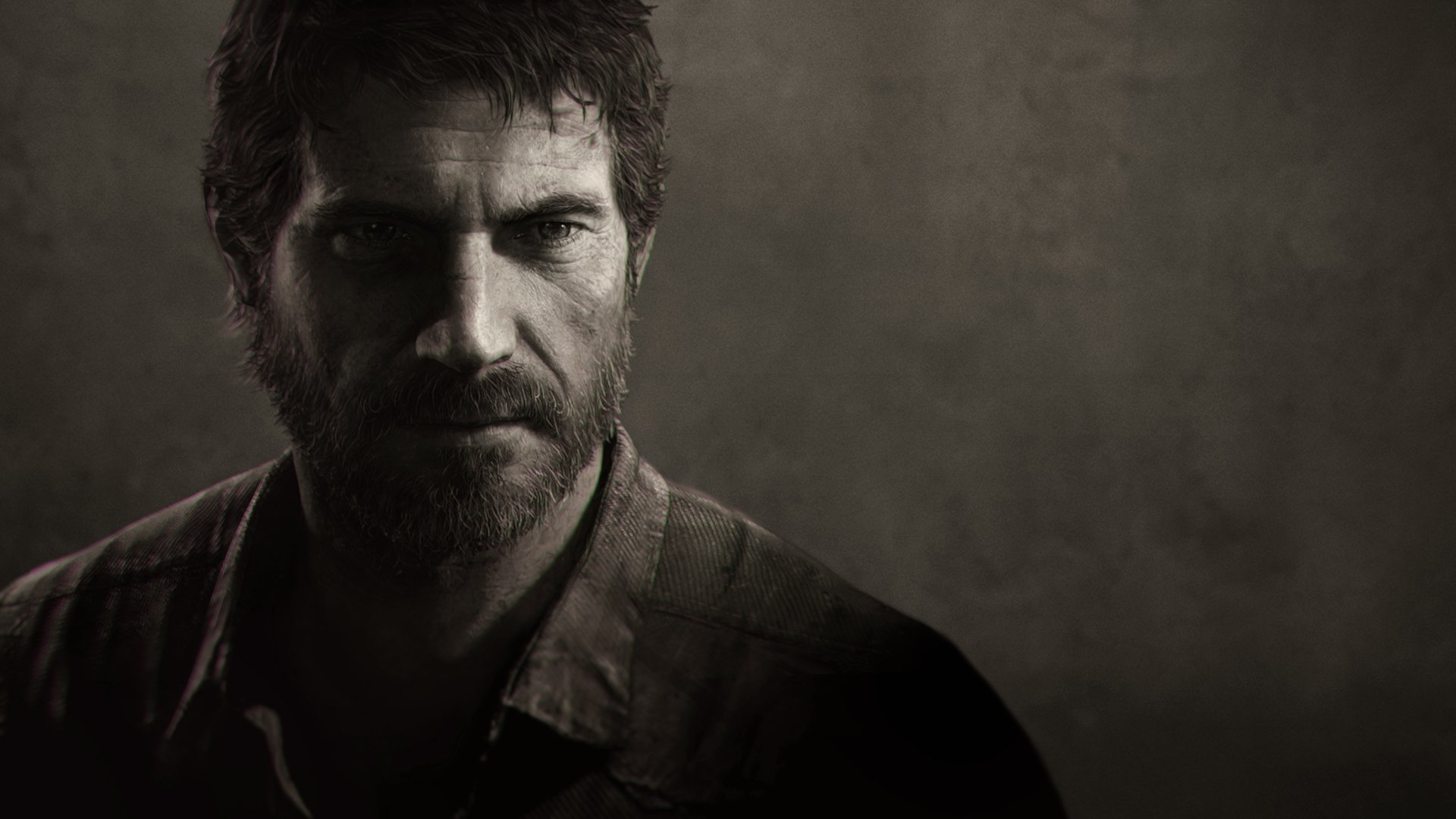 A dramatic HD desktop wallpaper featuring a close-up of a rugged character from the video game The Last of Us, showcasing intense expression and a dark, moody atmosphere.