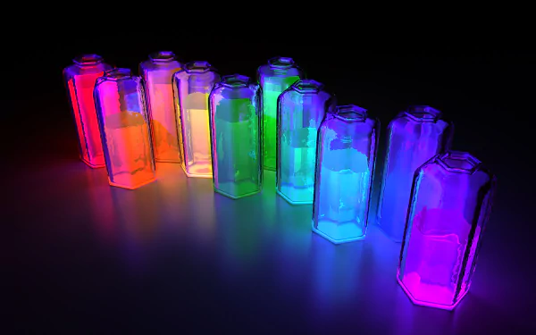 An abstract HD desktop wallpaper featuring a row of transparent bottles illuminated in vibrant rainbow colors against a dark background, creating a striking visual contrast.