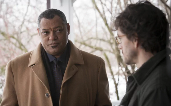 Two men in winter coats talk outdoors in a tense moment from the TV series Hannibal — 2K Quad HD PC desktop wallpaper.