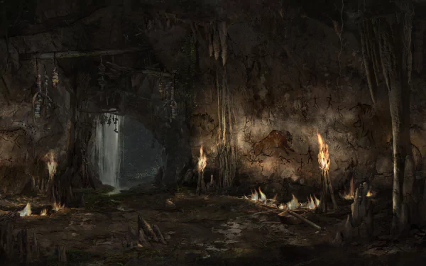 A dark, atmospheric scene from Far Cry Primal, featuring a cave entrance illuminated by flickering torches, creating a sense of mystery and adventure. HD desktop wallpaper.