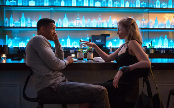 HD desktop wallpaper featuring Margot Robbie and Will Smith sharing drinks and intense focus at a stylish bar setting from the movie Focus.