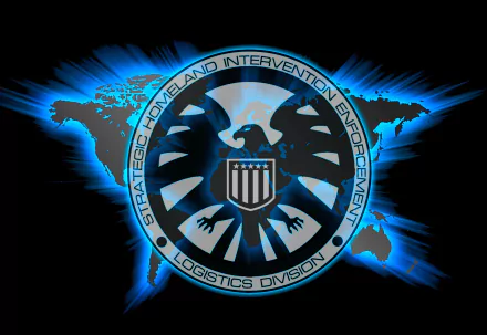 HD desktop wallpaper featuring the S.H.I.E.L.D. logo, set against a dynamic blue background. Emphasizes the strategic role of the organization in intervention and enforcement.
