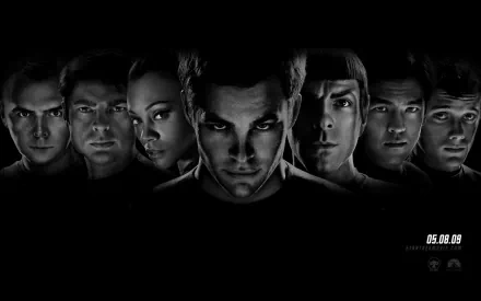 A striking HD desktop wallpaper featuring the main cast of the movie Star Trek, showcasing a dynamic arrangement of characters against a dark background with a cinematic feel.