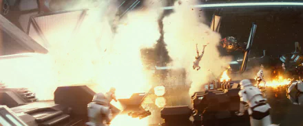 Explosive battle scene from Star Wars Episode VII: The Force Awakens; stormtroopers amid fire, debris, and a falling figure aboard a ship — rendered as a 2K Quad HD PC desktop wallpaper/background.