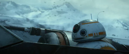 BB-8 explores a snowy landscape in this HD wallpaper from Star Wars Episode VII: The Force Awakens, showcasing the beloved droid amidst dramatic scenery.