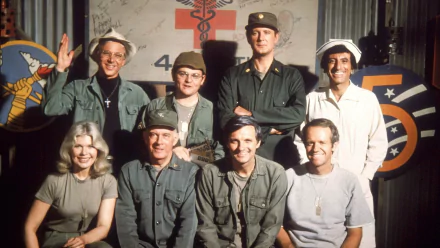 HD desktop wallpaper featuring the main cast of the TV show M*A*S*H, including Harry Morgan, Maxwell Klinger, B.J. Hunnicutt, Margaret Houlihan, Hawkeye, and Alan Alda.
