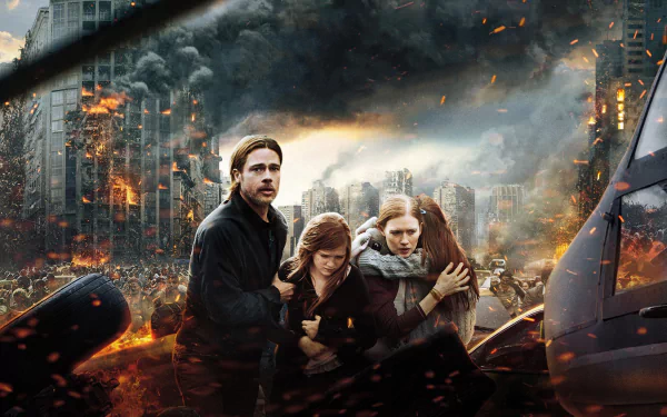 HD PC desktop wallpaper of World War Z movie — three survivors huddle amid a burning, collapsing cityscape with smoke, embers and dark storm clouds.