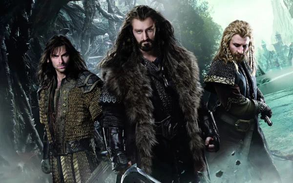 HD PC desktop wallpaper of three armored dwarves from The Hobbit: The Desolation of Smaug, standing resolute in a misty, rocky landscape, cloaks and swords at the ready.