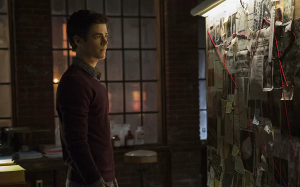 Barry Allen, portrayed by Grant Gustin, stands thoughtfully in front of a wall filled with clues in this HD wallpaper from the TV show *The Flash* (2014).