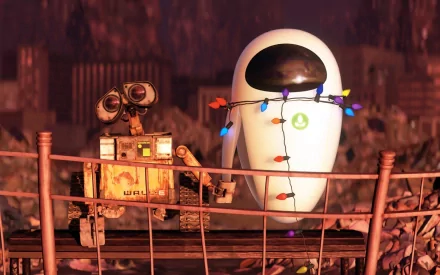 Eve and Wall·E stand together, surrounded by a post-apocalyptic landscape, illuminated by colorful lights. This HD wallpaper captures a memorable moment from the movie Wall·E.