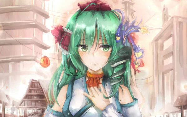 Hina Kagiyama from Touhou with long green hair and green eyes, wearing Japanese clothes and a snake accessory, stands blushing in front of a building in this HD anime wallpaper.