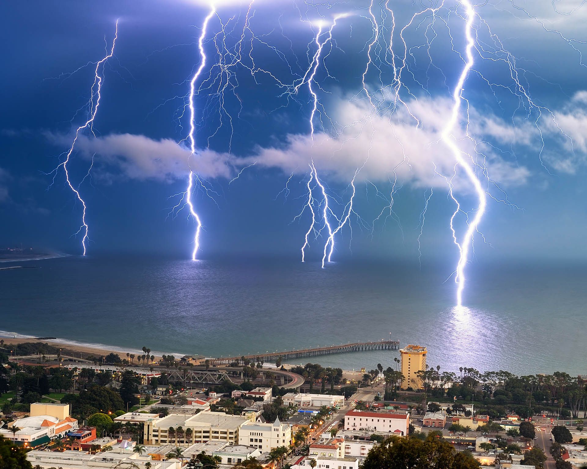 lightning bolts striking the Pacific Ocean off shore in Ventura