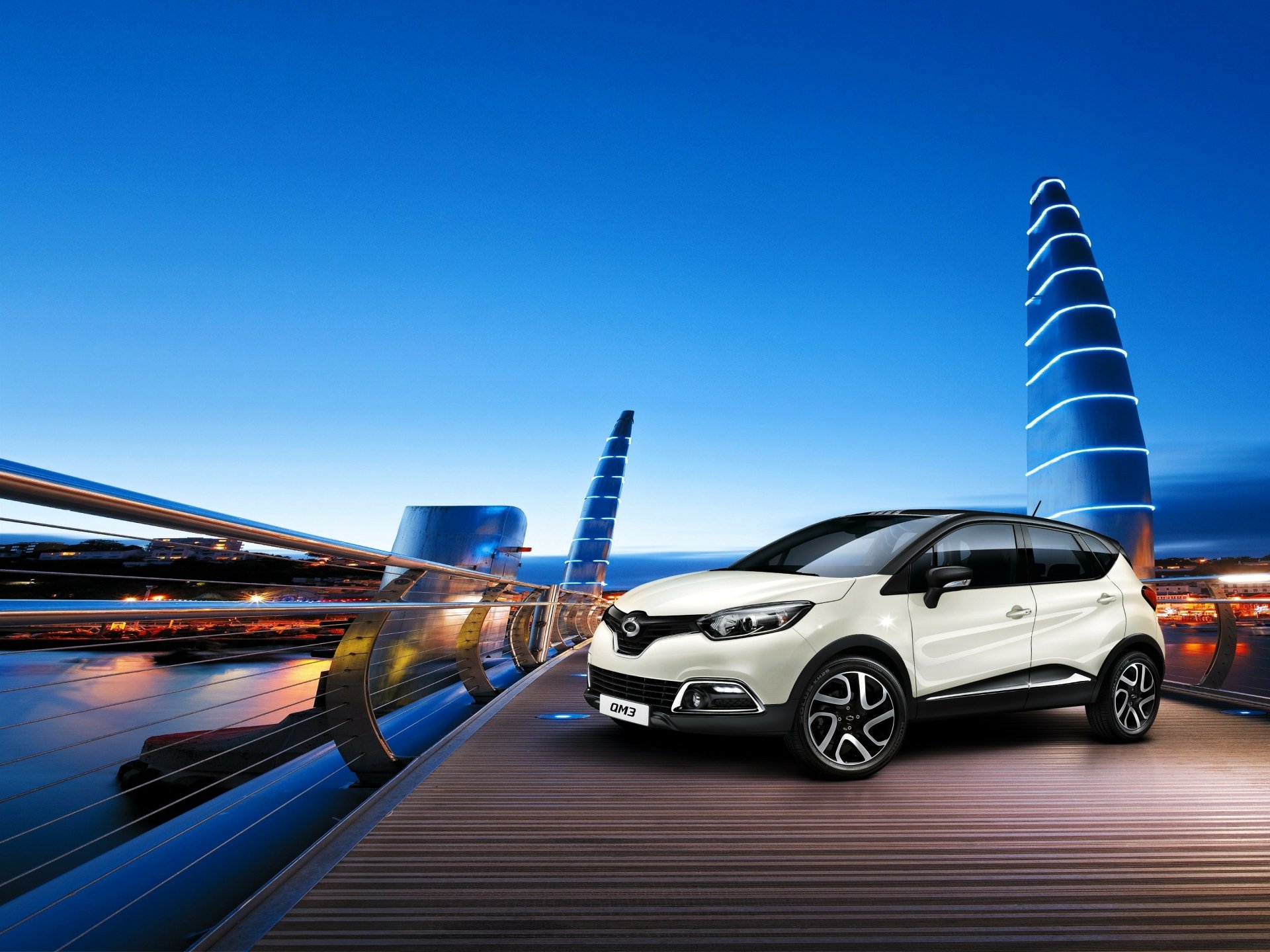 White Renault Captur SUV showcased on a modern city bridge with futuristic light trails, presented as an HD PC desktop wallpaper and background.