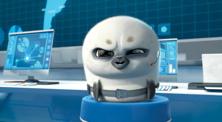 Fluffy round baby penguin with a tiny headset in a high-tech control room, from the Penguins of Madagascar movie — 2K Quad HD PC desktop wallpaper and background.