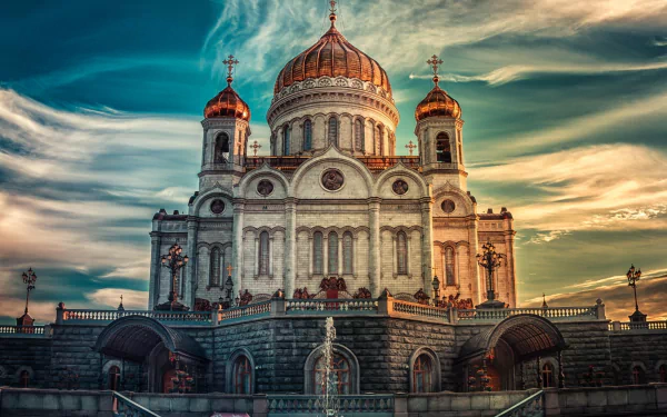 Dome of the Cathedral of Christ the Saviour in Russia, showcasing stunning architecture with golden accents against a dramatic sky. A captivating HD wallpaper.
