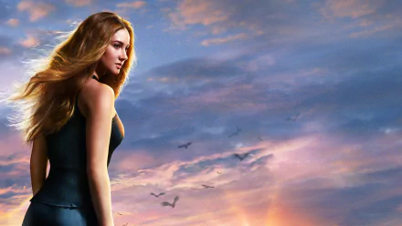 A dramatic HD desktop wallpaper from the movie Divergent, featuring a young woman with flowing hair against a vibrant sunset, capturing the essence of adventure and determination.