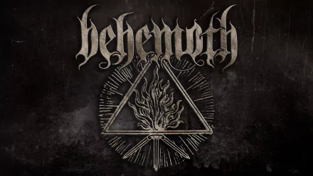 Music HD PC desktop wallpaper and background: Behemoth logo over a dark textured backdrop with a flaming triangle emblem and radiating lines.