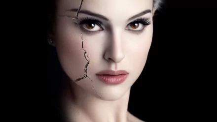 HD desktop wallpaper: close-up of a woman's face in Black Swan-style makeup, dramatic eyes and a cracked porcelain effect.