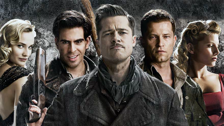 HD desktop wallpaper featuring Eli Roth, Til Schweiger, Diane Kruger, Melanie Laurent, and Brad Pitt from the movie Inglourious Basterds in a dramatic group pose.