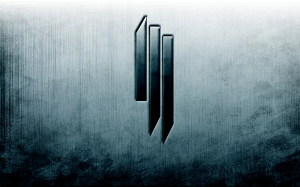 A sleek HD desktop wallpaper featuring the iconic Skrillex logo, set against a textured gray background, embodying the energy of electronic music.