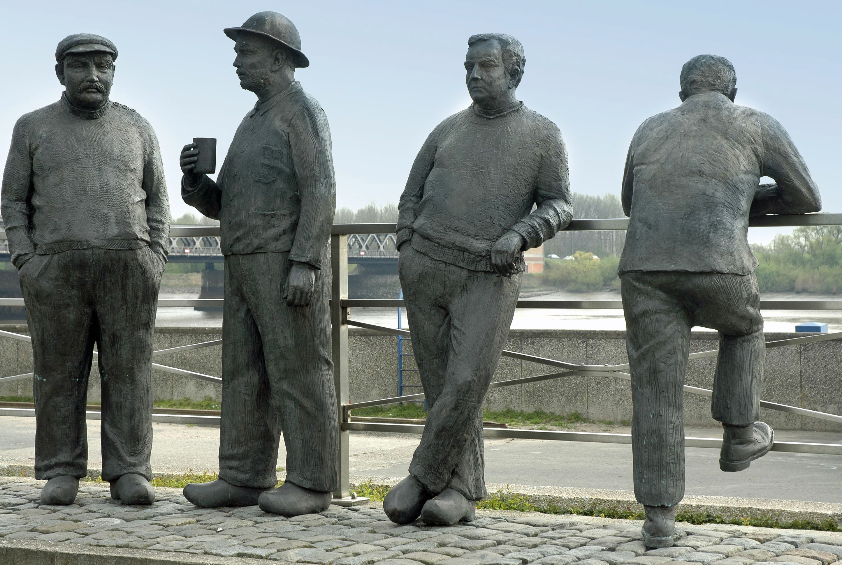 Statues of men just standing around in the Netherlands by 12019