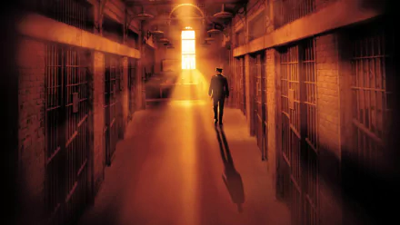 A haunting image inspired by The Green Mile, featuring a solitary figure walking down a dimly lit jail corridor, with light streaming through a tall barred window.