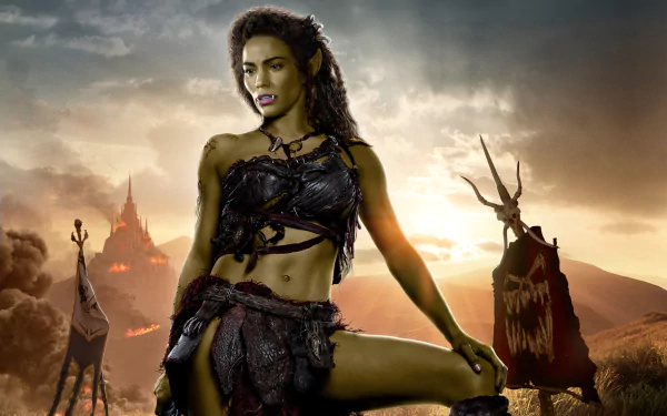 4K Ultra HD Warcraft movie wallpaper featuring a fierce female orc warrior in tribal armor against a dramatic, smoky battlefield backdrop with war banners.