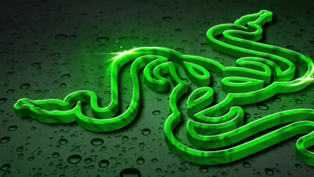 A vibrant HD desktop wallpaper featuring the iconic Razer logo in striking green against a textured, water droplets background, highlighting technology and innovation.