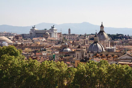 A stunning 4K Ultra HD man-made skyline of Rome with historic domes and buildings stretching across the city under a clear sky, framed by green foliage in the foreground.