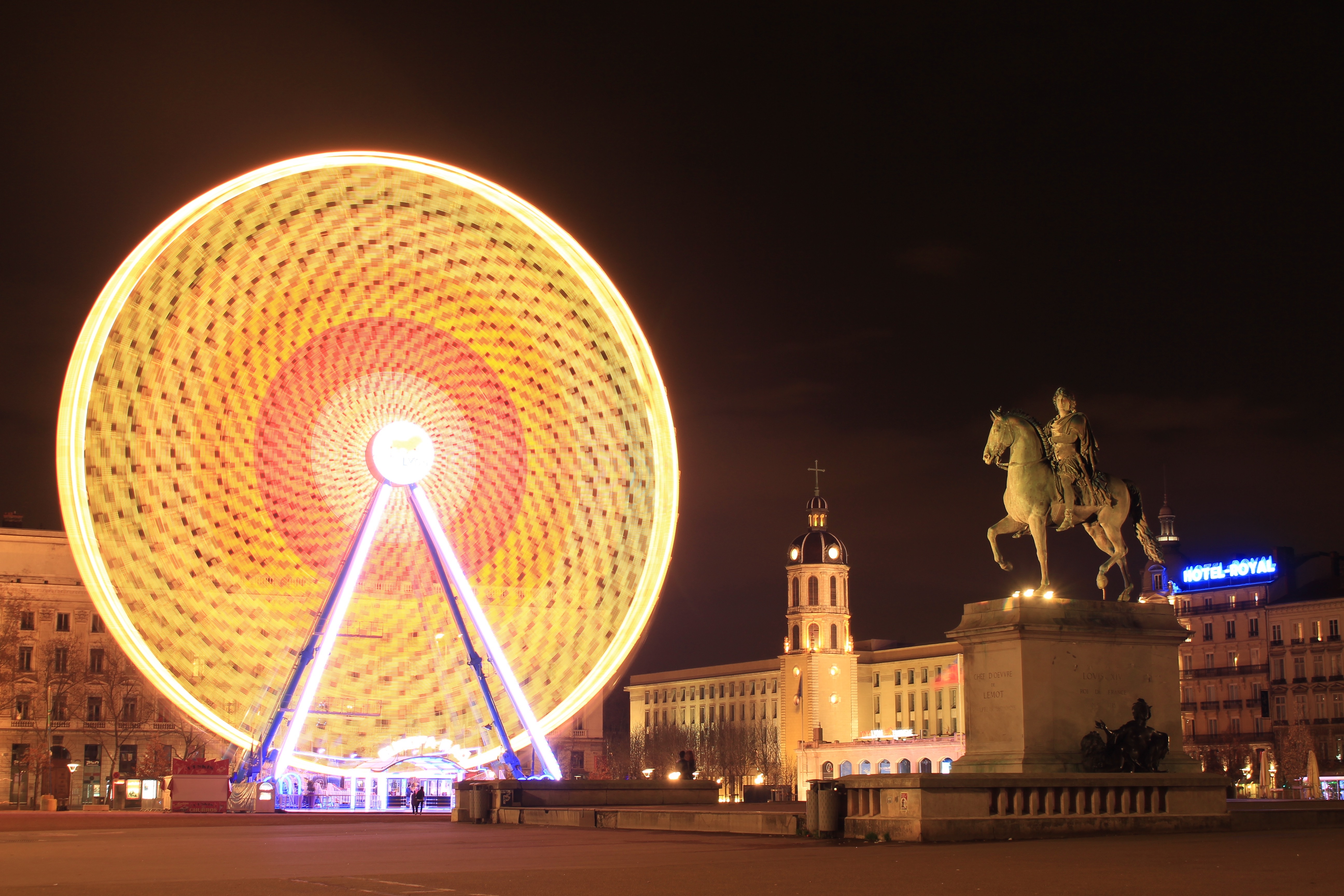 Ferris Wheel and Statue of King Louis XIV in La Place Bellecour Lyon, France by Thomas43