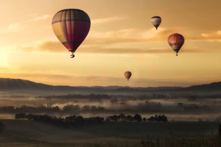  Ballooning over an early morning misty valley by Cleverpix