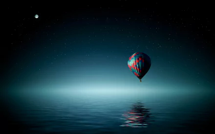 A vibrant hot air balloon hovers over a tranquil ocean under a starry night sky, with the moon shining brightly, creating a serene atmosphere in this HD desktop wallpaper.