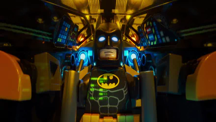 HD desktop wallpaper featuring Batman from The Lego Batman Movie, showcasing a detailed Lego figure in a vibrant, illuminated cockpit.