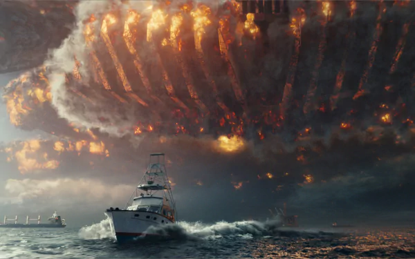 HD PC desktop wallpaper featuring a dramatic scene from the movie Independence Day: Resurgence with a fishing boat facing an enormous fiery alien spaceship overhead.