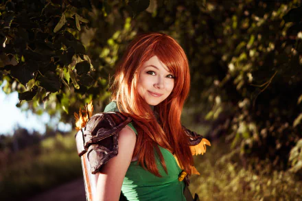 A woman in a vibrant Windranger cosplay from DotA 2 stands confidently outdoors, showcasing her detailed costume against a lush background. This HD image serves as an impressive desktop wallpaper.