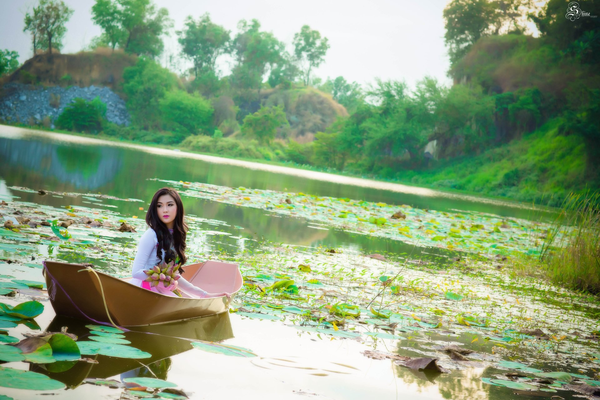 Serene Moment: Asian Woman on a Boat - 4K Ultra HD Wallpaper