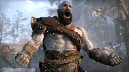 HD desktop wallpaper of Kratos from the video game God of War (2018), showcasing the character in a snow-covered environment with a powerful and intense expression.
