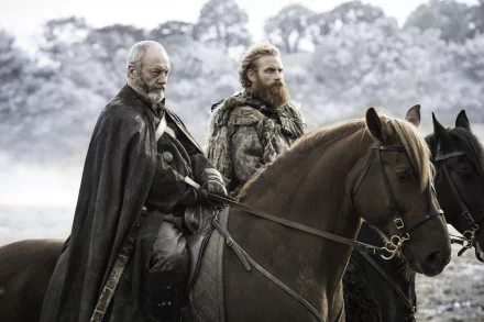 Tormund Giantsbane and Davos Seaworth, played by Kristofer Hivju and Liam Cunningham in Game of Thrones, ride horses through a snowy landscape in this 4K Ultra HD desktop wallpaper.