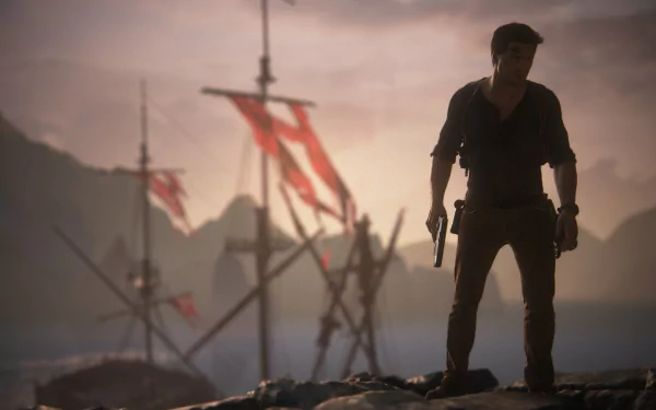 A silhouette of Nathan Drake from Uncharted 4: A Thief's End stands against a dramatic sunset, with ships featuring red flags in the background, creating an adventurous atmosphere.