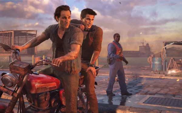 High-definition wallpaper featuring Nathan Drake and Samuel Drake from the video game Uncharted 4: A Thief's End, captured on a motorcycle against a vibrant sunset backdrop.