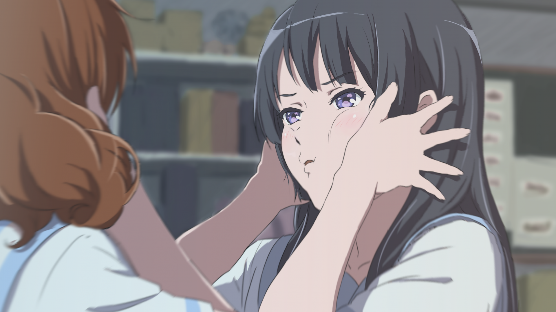 HD anime wallpaper featuring Reina Kousaka gently holding Kumiko Oumae's face from Sound! Euphonium, capturing an emotional moment between the characters.