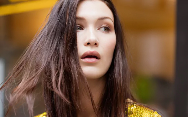 Close-up of brunette American model and celebrity Bella Hadid, captured in high detail for a 4K Ultra HD PC desktop wallpaper and background.
