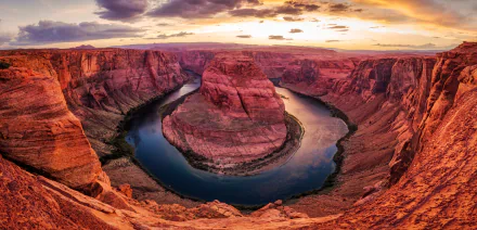 Horseshoe Bend, Arizona: sweeping canyon and Colorado River loop at sunset, vivid nature scene — 2K Quad HD PC desktop wallpaper/background.