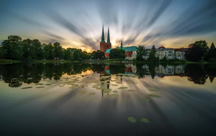 reflection sunset sky tree pond Lubeck cathedral Lübeck Germany religious cathedral HD Desktop Wallpaper | Background Image