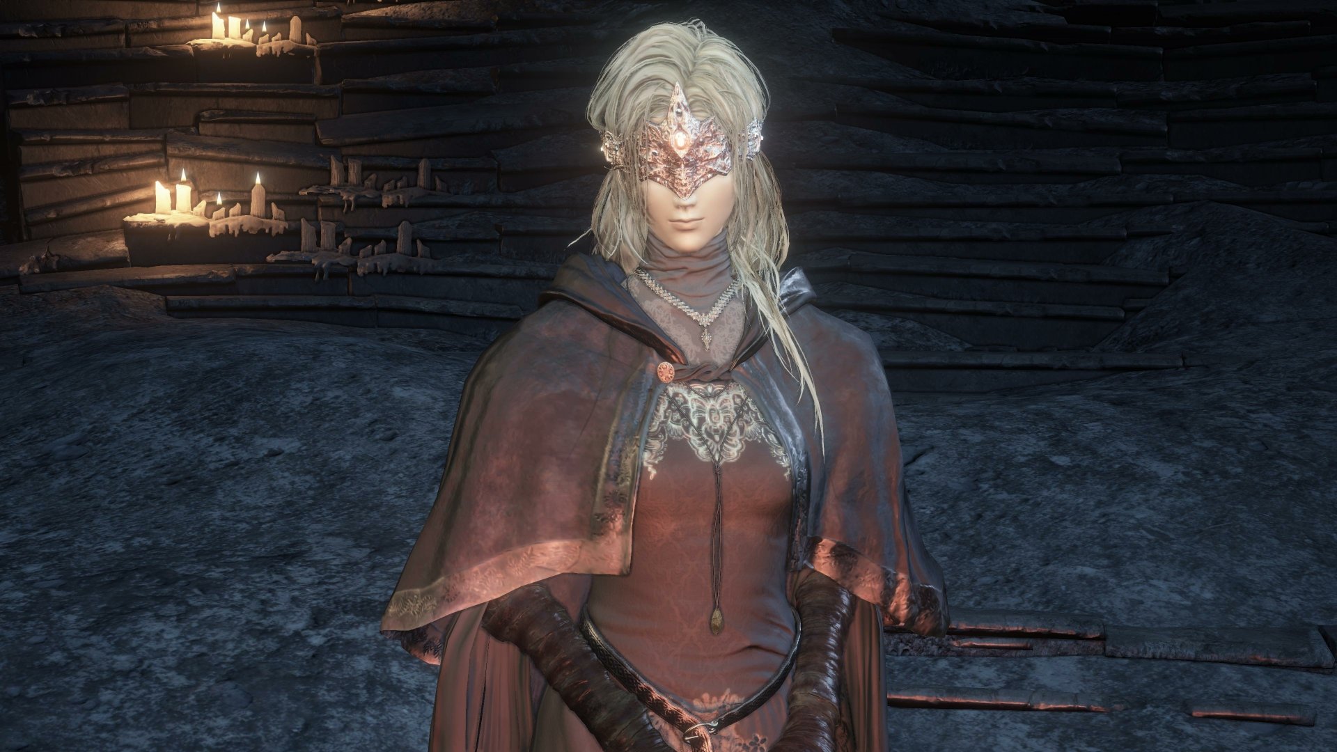 Video game Dark Souls III 4K Ultra HD PC desktop wallpaper: veiled silver‑haired woman in a red cloak stands in a candlelit stone chamber.