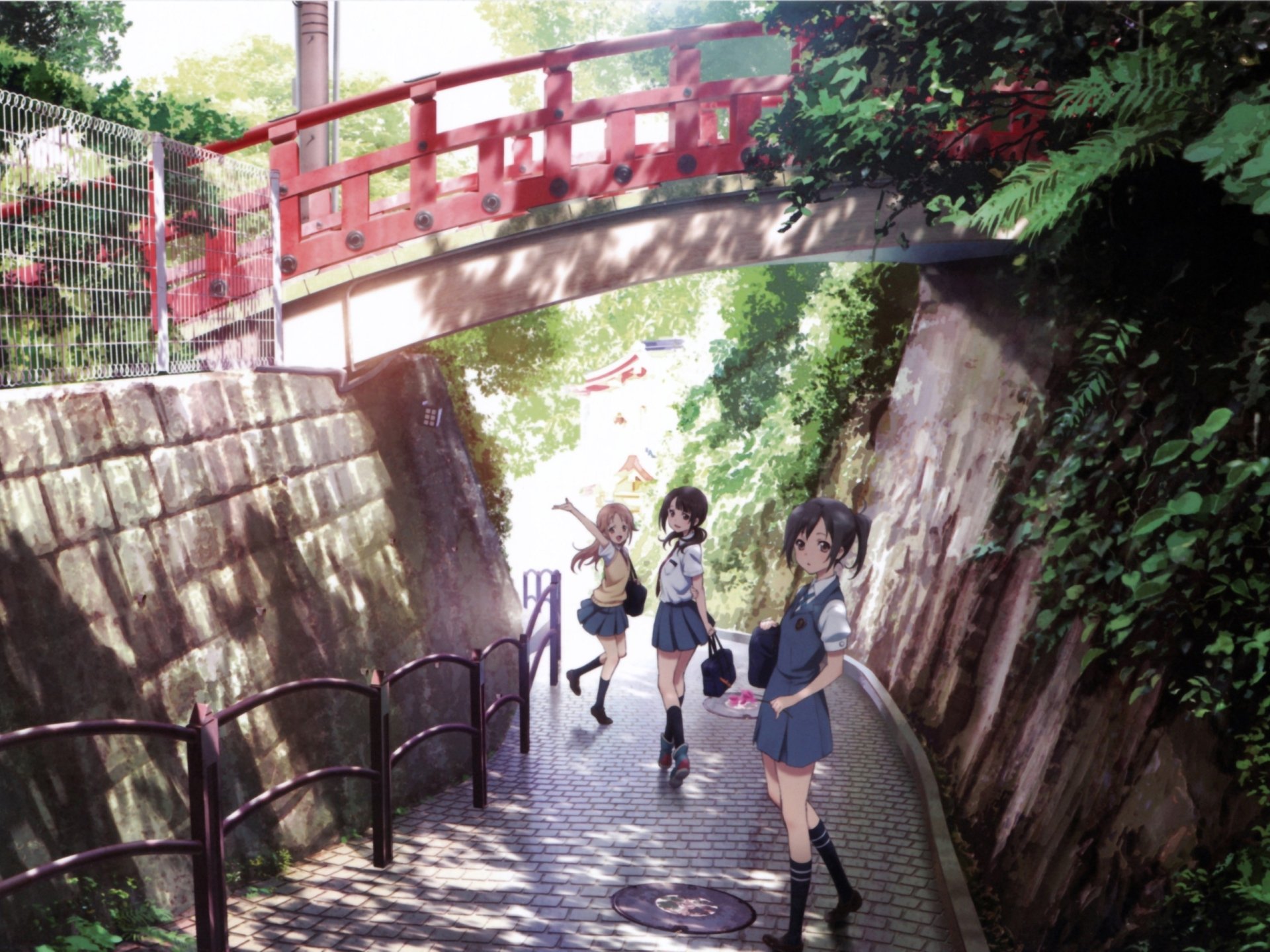 Anime-style HD PC desktop wallpaper featuring three girls from Tari Tari walking under a red bridge surrounded by lush greenery and stone walls.