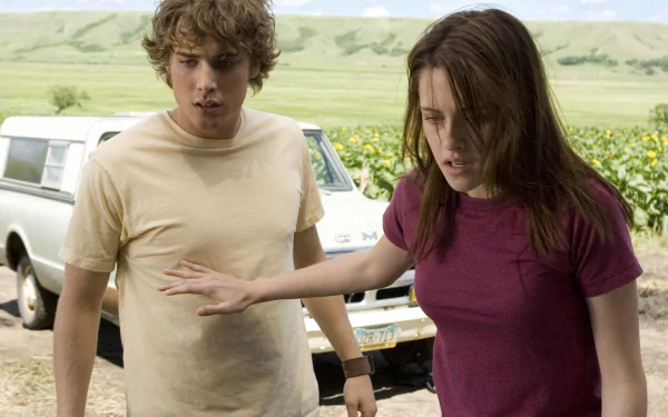 HD desktop wallpaper featuring Kristen Stewart and a co-star in a scene from the movie The Messengers, set against a rural landscape with a white pickup truck.