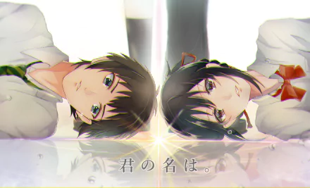 A stunning HD wallpaper featuring Taki Tachibana and Mitsuha Miyamizu from the anime Your Name. Their faces reflect a moment of connection, enhanced by a magical glow.