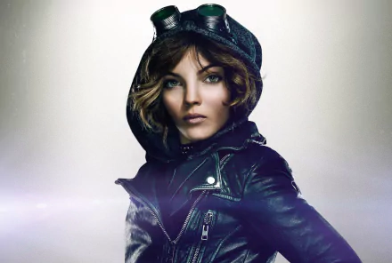 HD desktop wallpaper of Camren Renee Bicondova as Selina Kyle/Catwoman from the Gotham TV show, featuring her in a black leather jacket and goggles.